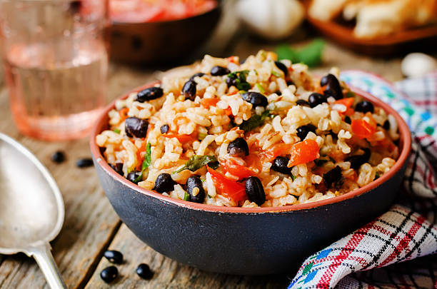 istock Mexican tomato black beans rice with cilantro 484035484