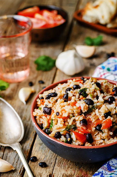 istock Mexican tomato black beans rice with cilantro 484035486