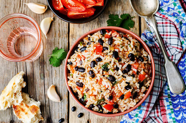 istock Mexican tomato black beans rice with cilantro 484035492