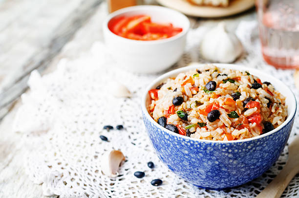 istock Mexican tomato black beans rice with cilantro 484035494