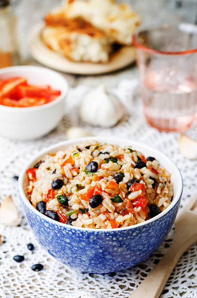 istock Mexican tomato black beans rice with cilantro 484035496