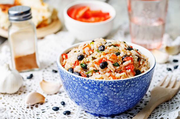 istock Mexican tomato black beans rice with cilantro 484035498