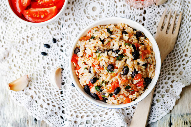 istock Mexican tomato black beans rice with cilantro 484035500