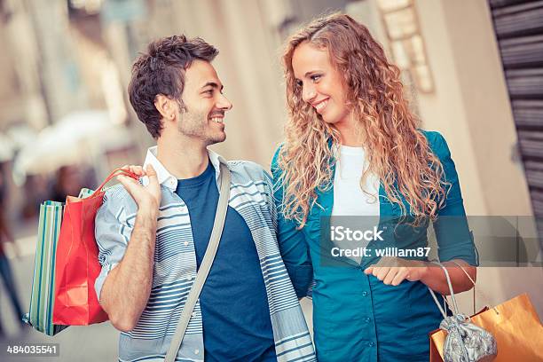 Young Couple With Shopping Bags Stock Photo - Download Image Now - Adult, Bag, Beautiful People