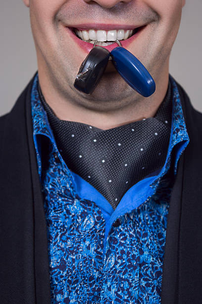 istock car keys in his mouth 484037573