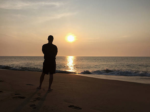 istock One Man. One Sea, One Sunrise 484039852