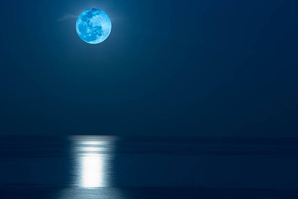 istock Moonrise over the Sea 484040376