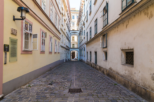 Vienna, Austria - August 8, 2015: A view along Blutgasse in Vienna during the day. Building exteriors can be seen.