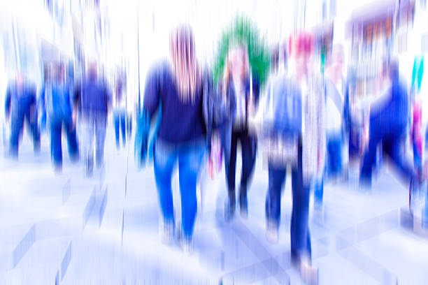 istock Busy crowd of people walking in metro station,blurred motion 484040780