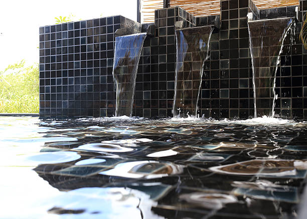 istock flowing water decorated in swimming pool 484042744