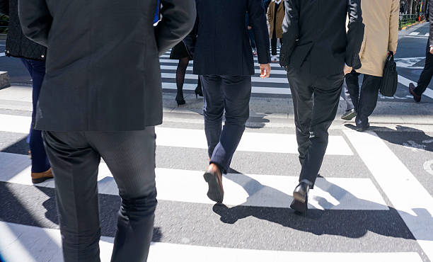 istock Businessmen walking in the street 484043540