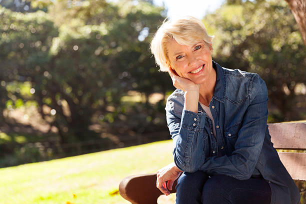 istock mid age woman looking at the camera 484051012