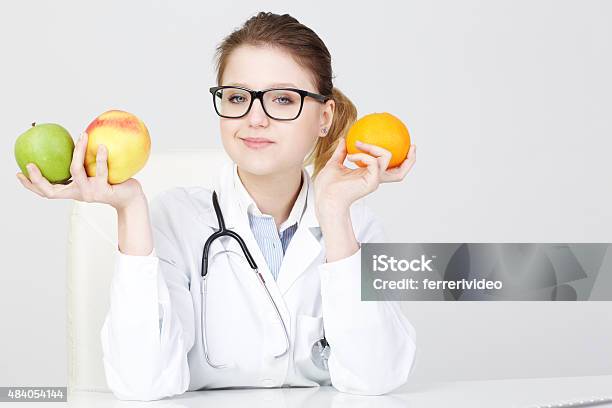 Nutritionist Doctor Stock Photo - Download Image Now - 2015, Alternative Medicine, Apple - Fruit