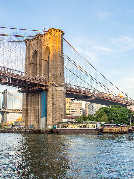 istock Brooklyn bridge from a Boat - New York 484055634