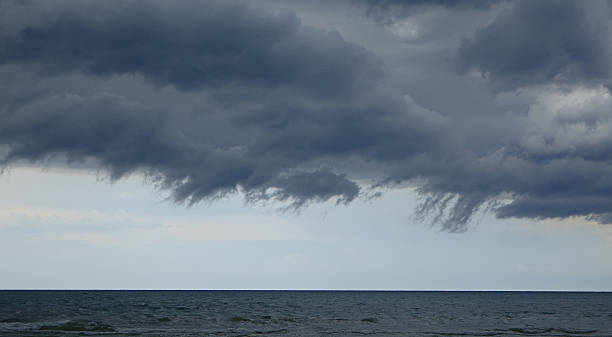istock Unusual Dark Clouds Over Lake 484058642