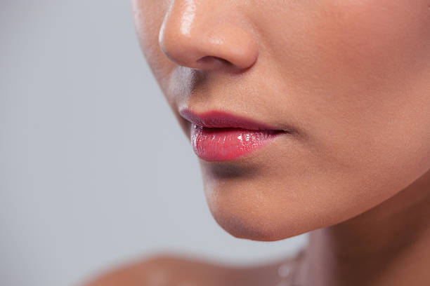 istock Cropped image of female face 484059042