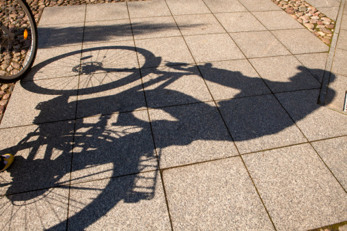 Shadow bikes on a sunny day