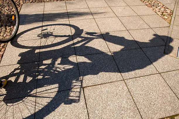 Photo of Shadow bikes on a sunny day
