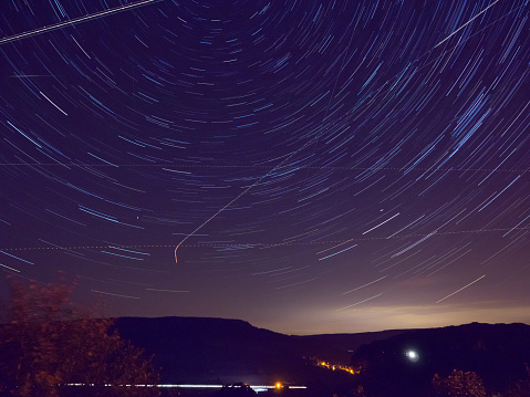 A long , 30 minute , exposure of the sky at might with planes, going into Manchester Airport, Star trails, revolving around the pole star ,  and a few meteors from The Perseid meteor shower,