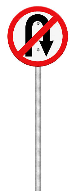 istock No U-turn road sign isolate on white background 484065915