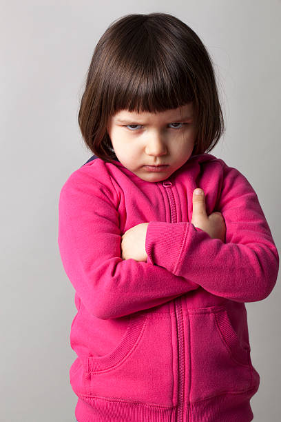 istock offended infant giving a dirty look to the camera 484067052