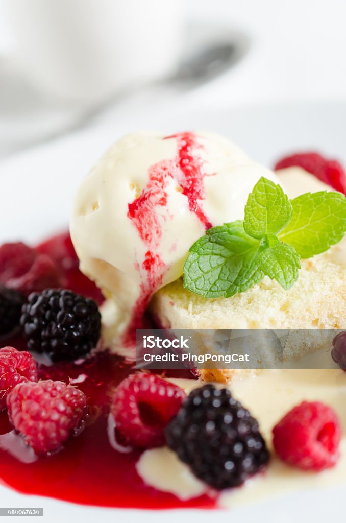 Fruit, ice cream, vanilla sauce and pound cake dessert Pound Cake Stock Photo