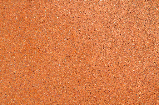Abstract background of sand on a tennis court.