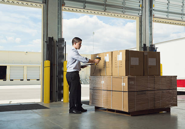 istock businessman at warehouse 484069225