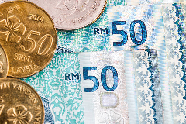 istock Closeup of Malaysia Ringgit currency notes and coins 484072598
