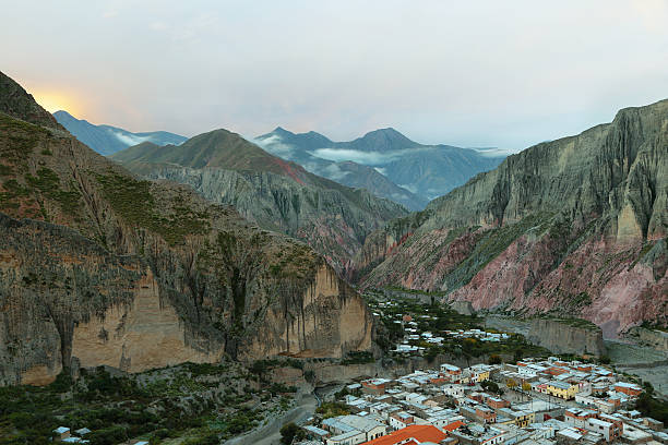 View of Iruya village and multicolored mountains View of Iruya village and multicolored mountains in the surroundings at sunset, Salta province, Argentina achinoam nini photos stock pictures, royalty-free photos & images