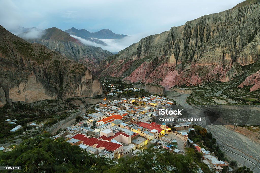 View of Iruya village and multicolored mountains View of Iruya village and multicolored mountains in the surroundings at sunset, Salta province, Argentina Argentina Stock Photo