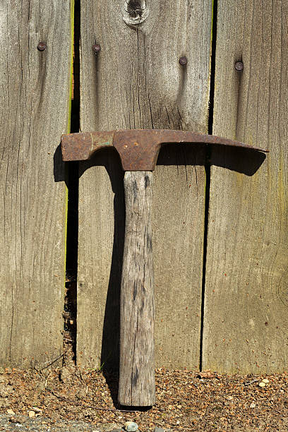 istock Old Hammer against Aged Fence 484076729