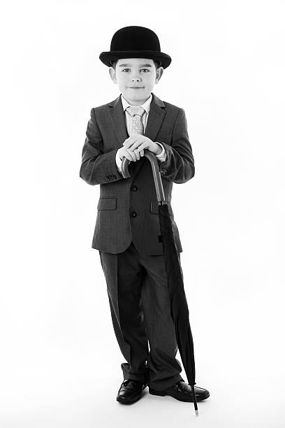 istock young kid dressed up as a business person 484077765