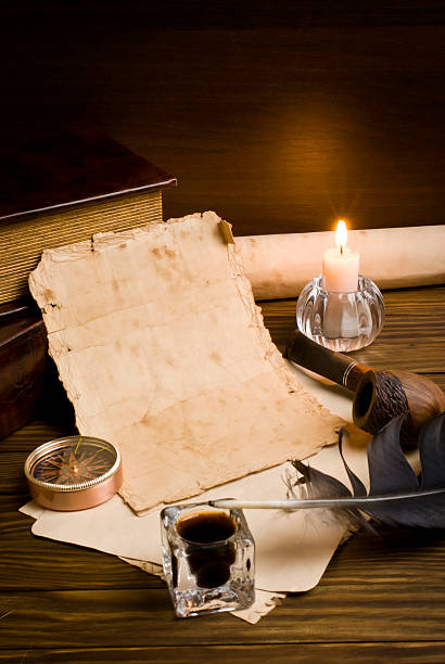 istock old papers and books on a wooden table 484078295