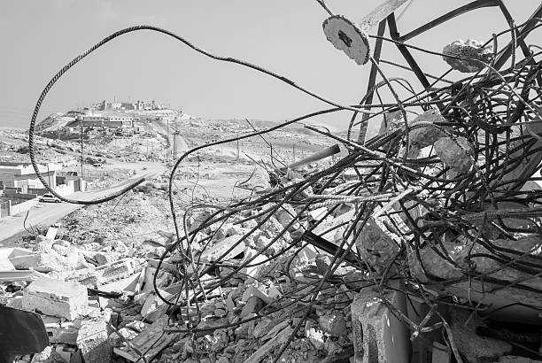 The remains of a home in the West Bank town of Anata, on the outskirts of Jerusalem, which was demolished hours earlier by Israeli authorities. Building permits are often difficult for Palestinians to obtain in and around Jerusalem, forcing many to build illegally in order to house their families.