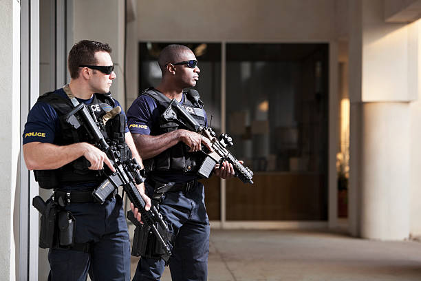 istock Police officers with rifles 484079563