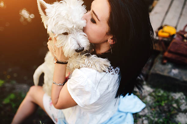 istock girl with her dog 484080000