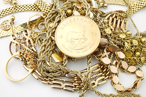 Vintage jewelry with old gold coin Krugerrand