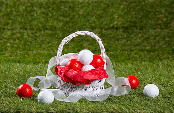 Easter Basket with Golf Balls and Ribbon stock photo