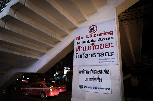 Bangkok, Thailand - August 8, 2015: No Littering sign waring the tourist not to litter in public places in Sukhumvit area, Bangkok.