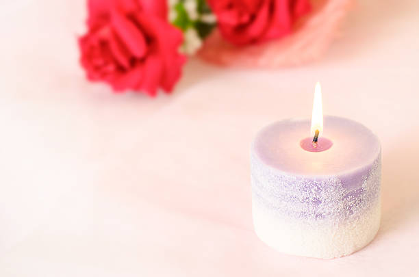 istock Romantic background - Aroma candle with red rose 484083378