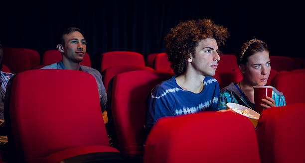 istock Young friends watching a film 484083510