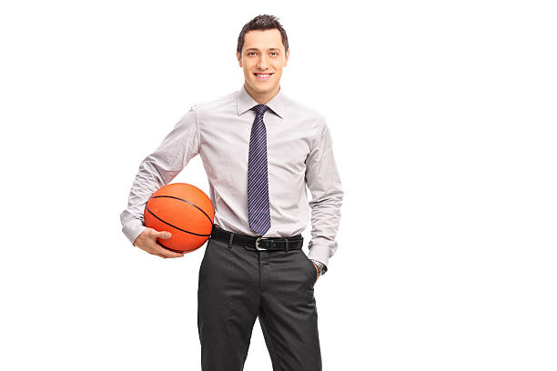 istock Young businessman holding a basketball 484083574