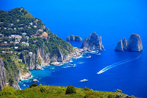 Capri island panorama from Monte Solaro, Faraglioni and Tyrrhenian sea, Bay of Naples, Italy.