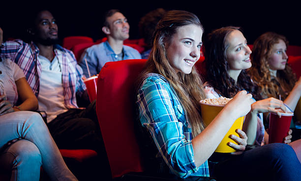 istock Young friends watching a film 484090776