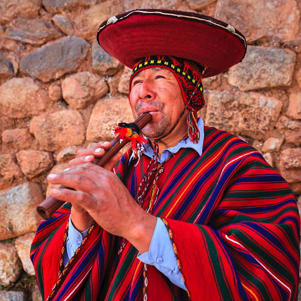 istock Portrait of Peruvian man playing a flute, Sacred Valley 484101239