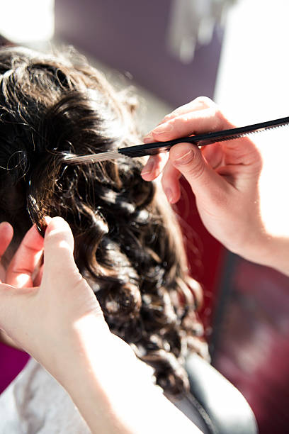 istock long brown curly woman's hair 484101917