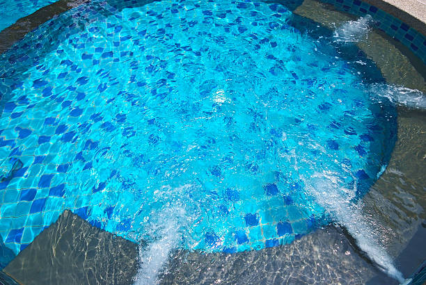 istock hot tub in the swimming pool. 484104711