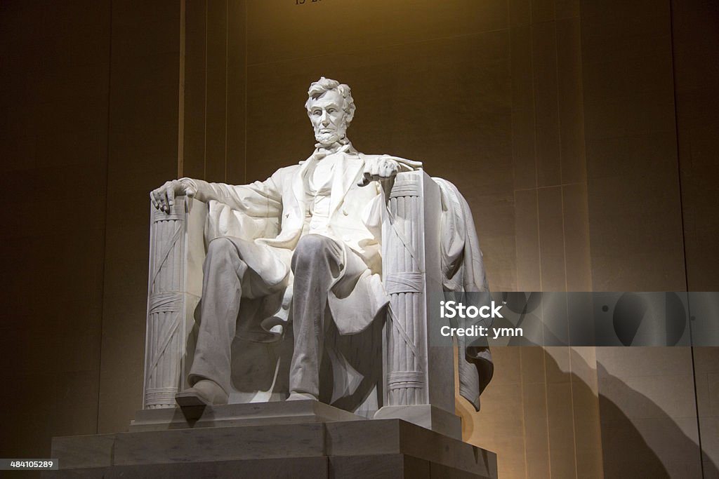Statue of Abraham Lincoln in Washington, DC Statue of Abraham Lincoln at the Lincoln Memorial in Washington, DC, at night. Lincoln Memorial Stock Photo