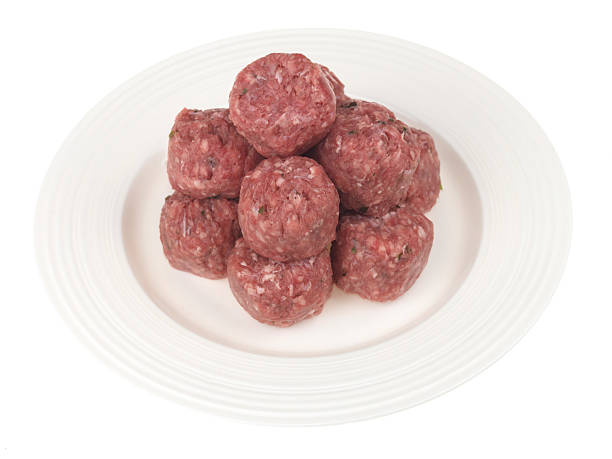 istock Plate of Raw Uncooked Fresh Beef Meatballs 484105326